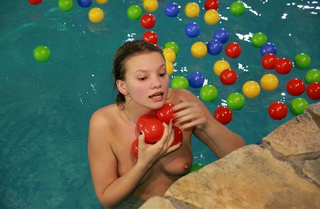 Water park at the weekend visited by a group of nudists photo