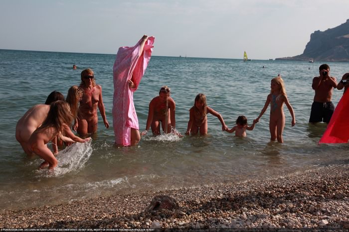 Neptune god patron of nudists - summer holiday nudists photo