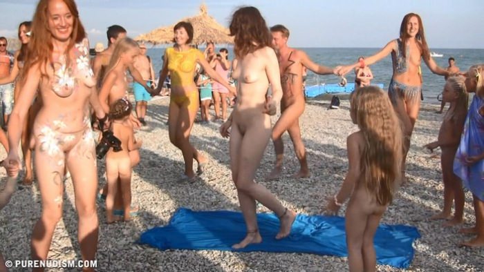 Nudist celebration carnival on the beach - Purenudism video